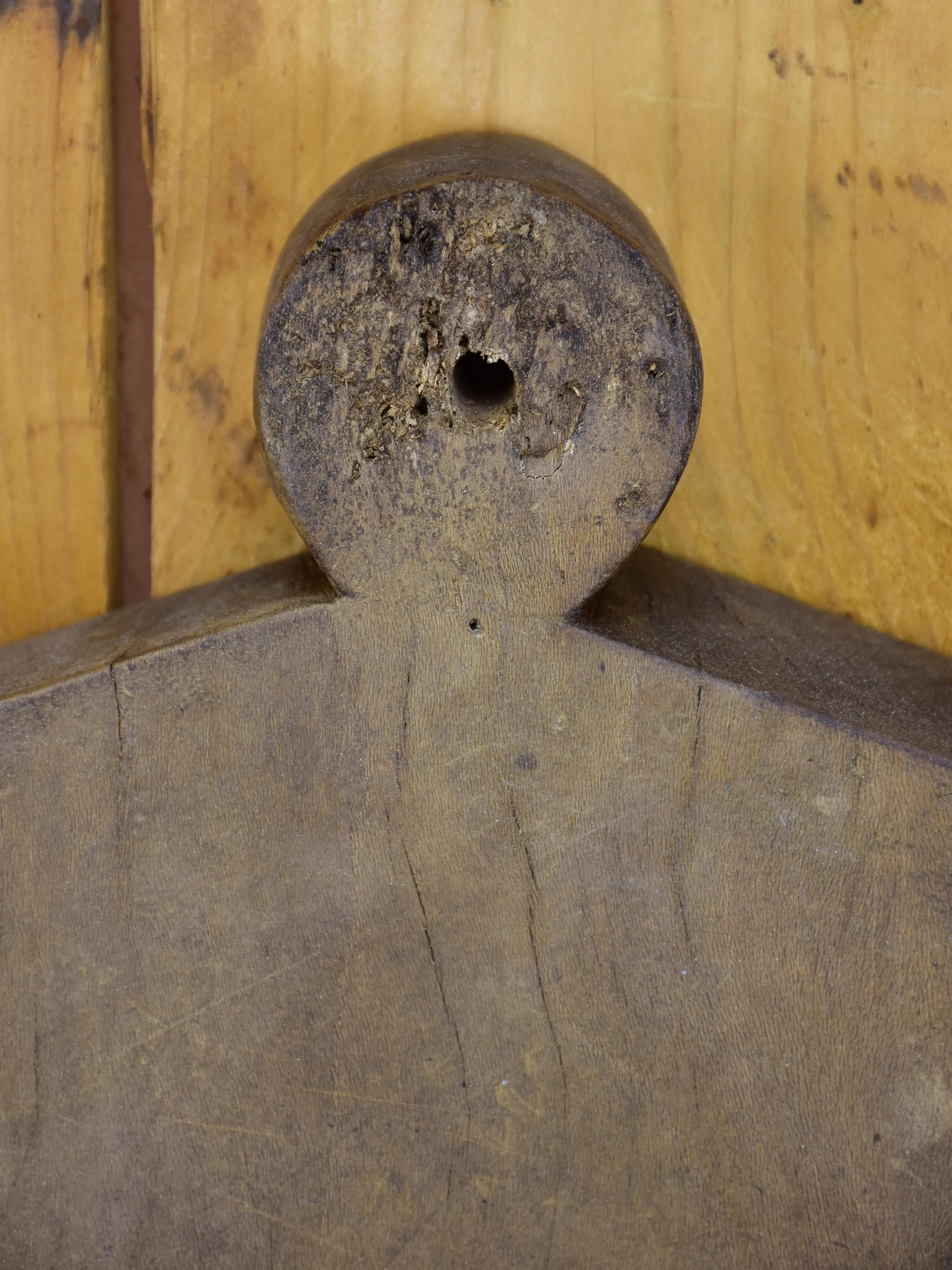 Antique French cutting board in the shape of a coat hanger