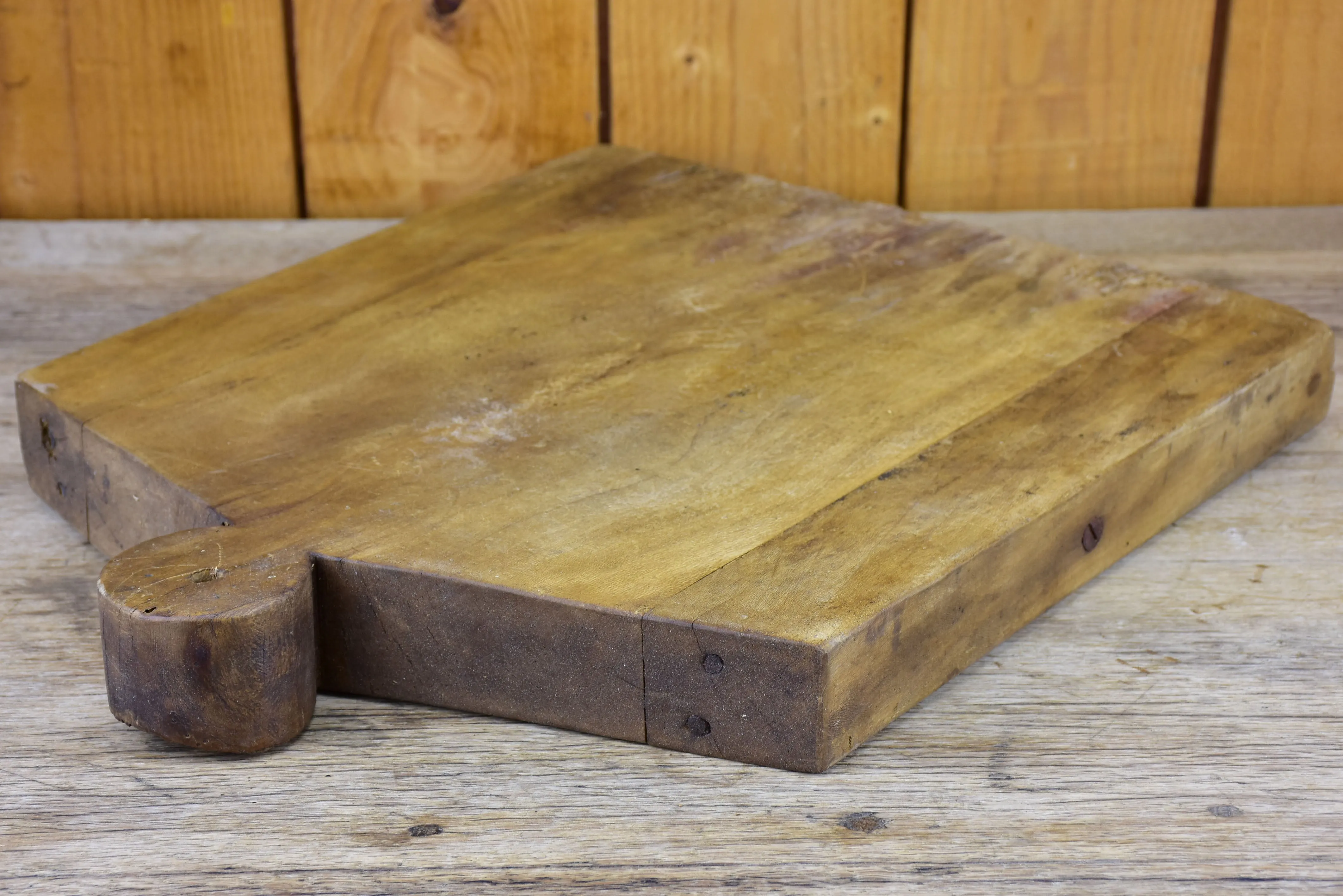 Antique French cutting board in the shape of a coat hanger