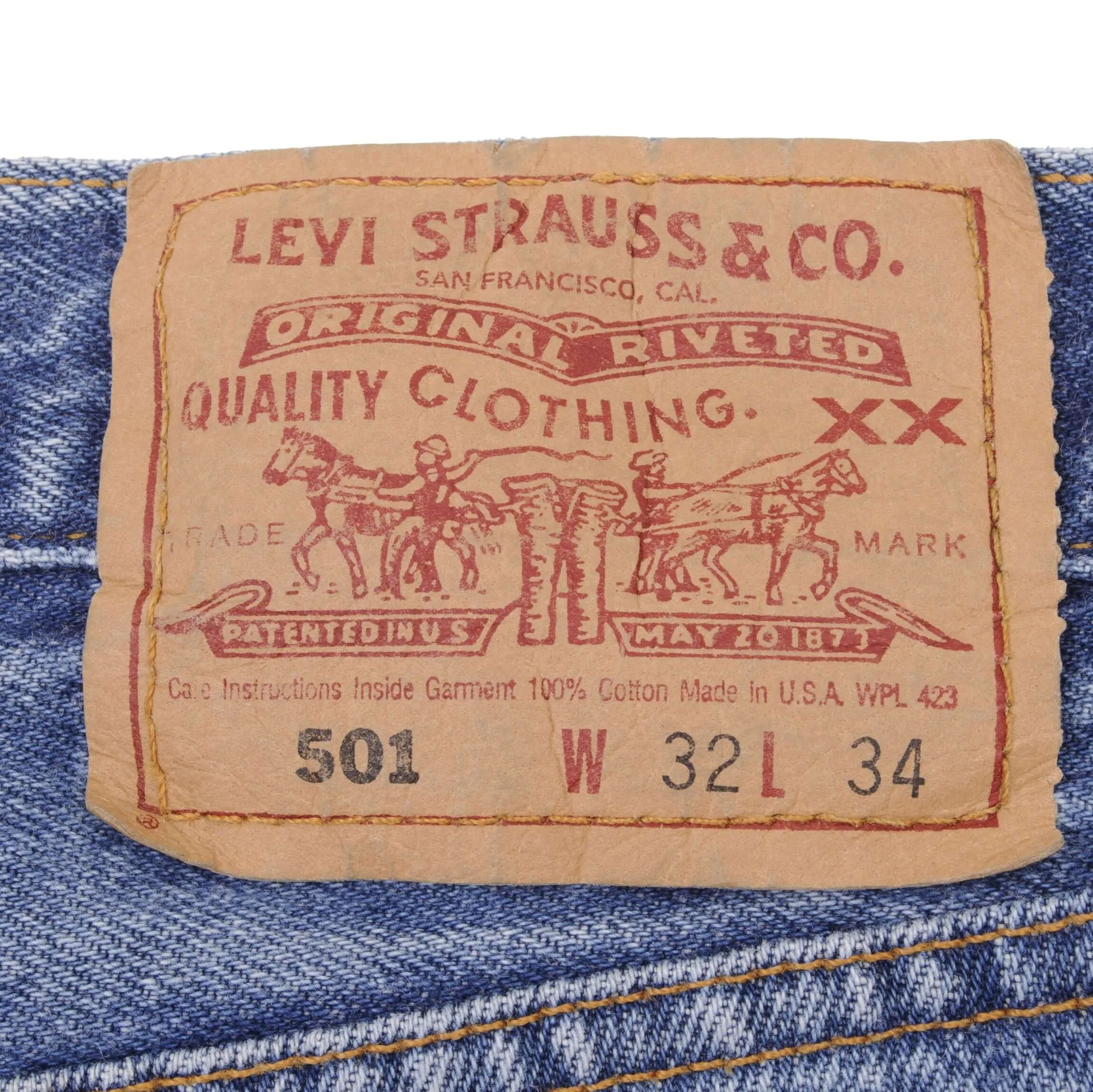 VINTAGE LEVIS 501 JEANS INDIGO 1990S SIZE W32 L34 MADE IN USA